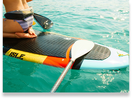 Close Up of a Girl Kneeling on a Stand Up Paddle Board